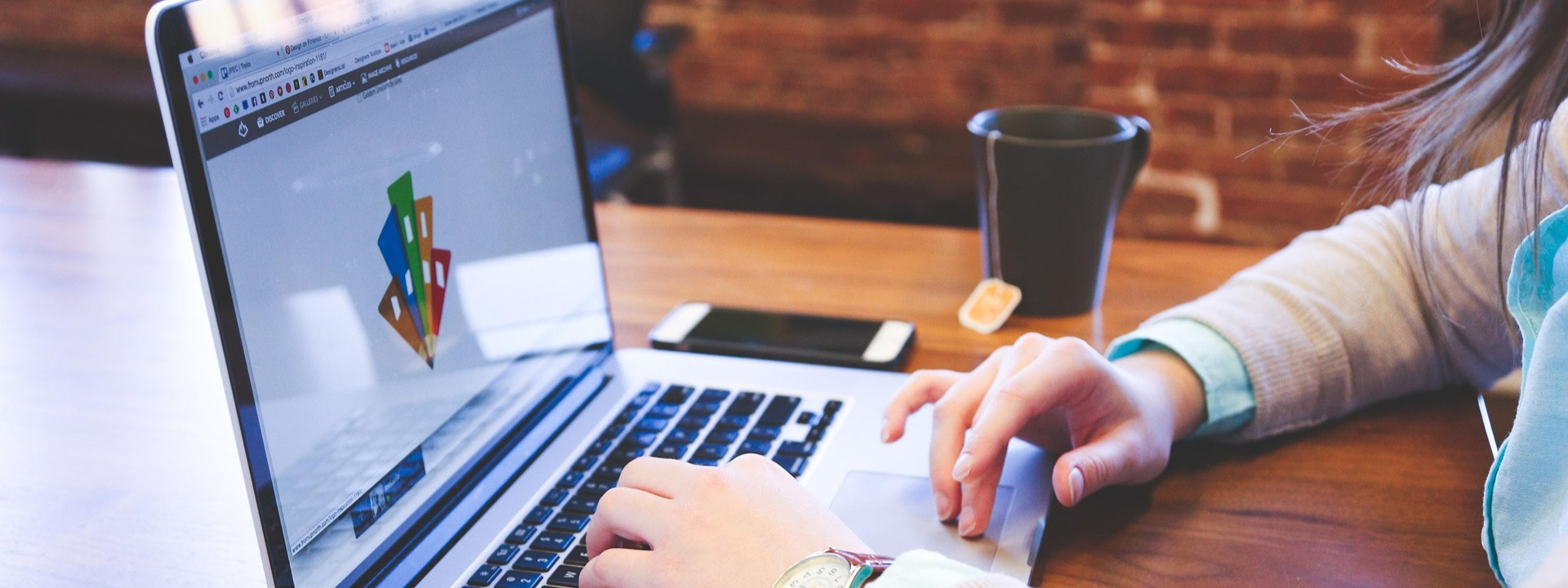 Typing on the laptop to demonstrate holiday marketing